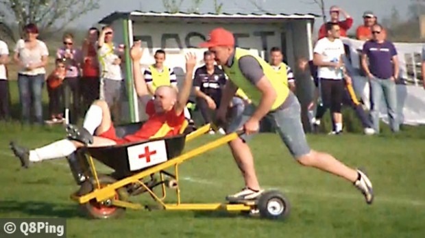 Motorised wheelbarrow used to stretcher off player